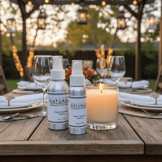 Tick Tock Naturals repellent sprays and a lit candle on an outdoor dining table.
